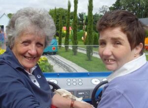 Mum and adult daughter at a theme park