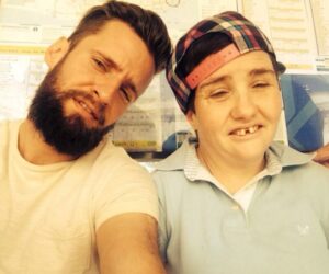 2 adults smiling