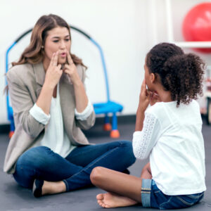 child receiving speech therapy