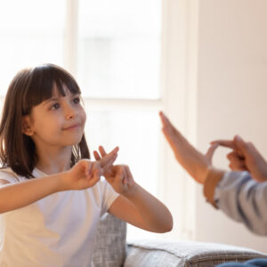 child using sign language